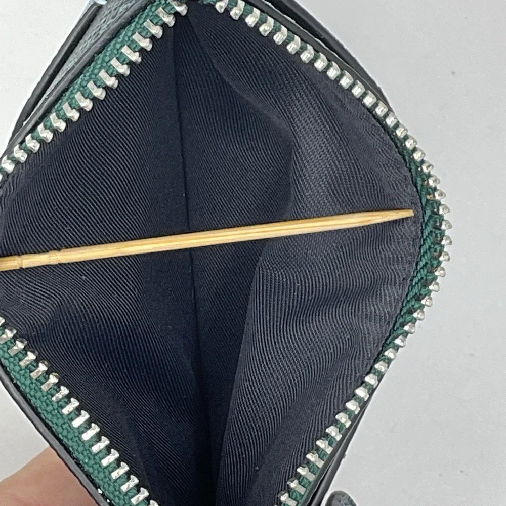 Coach zip top